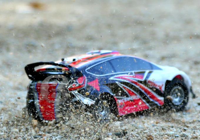 Wltoys A949 1:18 Scale 4WD High Speed Electric Rally Car Stunt Off-road RC Car with 2.4Ghz Transmitter - Red