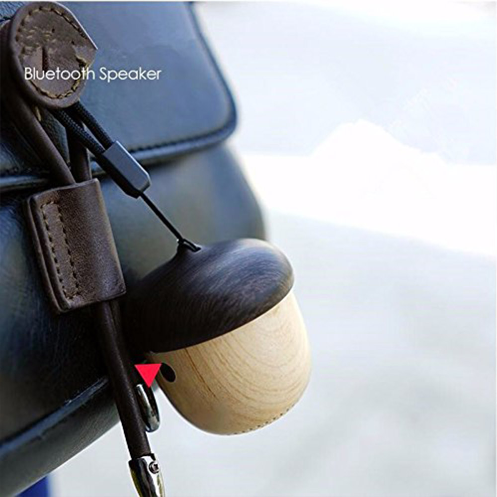 Haut-parleur Bluetooth sans fil ultra-portable J2 texture bois - marron