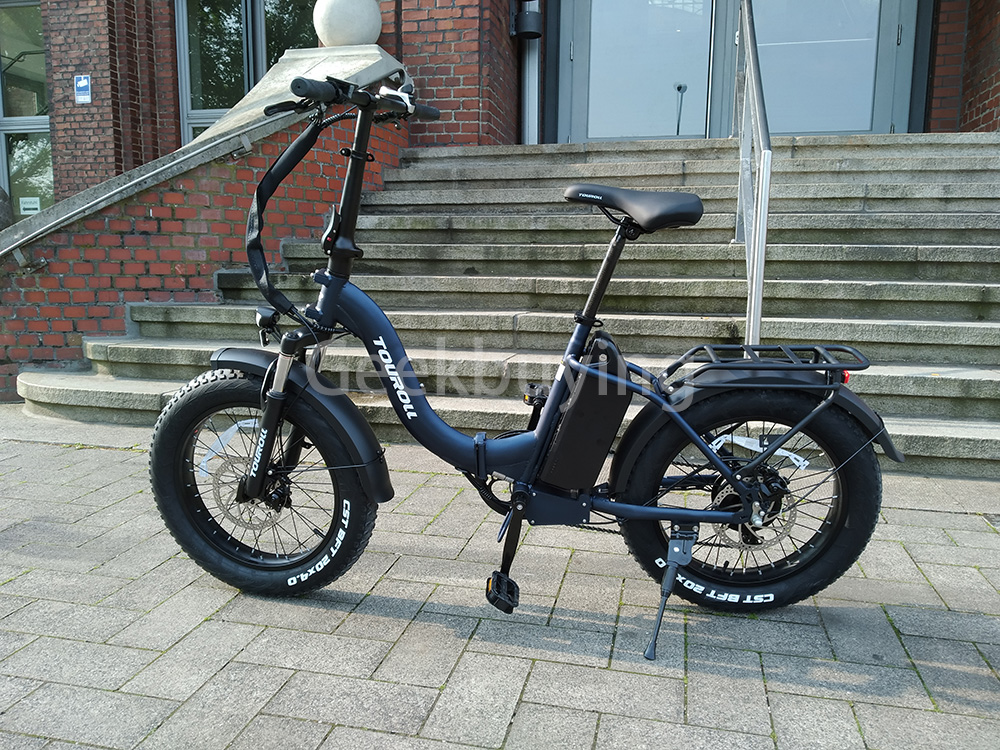 Touroll S2 Elektrofahrrad, 650 W max. Leistung, 48 V 15 Ah Akku, 20 x 4,0 Zoll Reifen, 25 km/h Max. Geschwindigkeit, 150 km max. Reichweite, mechanische Scheibenbremse & E-Bremse, mechanischer Stoßdämpfer, Shimano 7-Gang-Getriebe