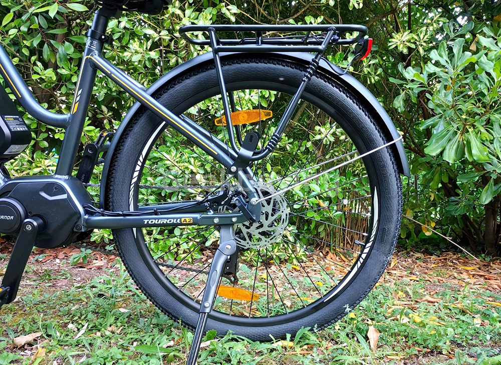 Touroll MA2 Vélo électrique, moteur central 250 W, batterie 36 V 13 Ah, pneus 27,5 pouces, vitesse maximale 25 km/h, autonomie maximale 100 km, frein à disque hydraulique, fourche à suspension avec blocage, transmission Shimano 7 vitesses - Gris