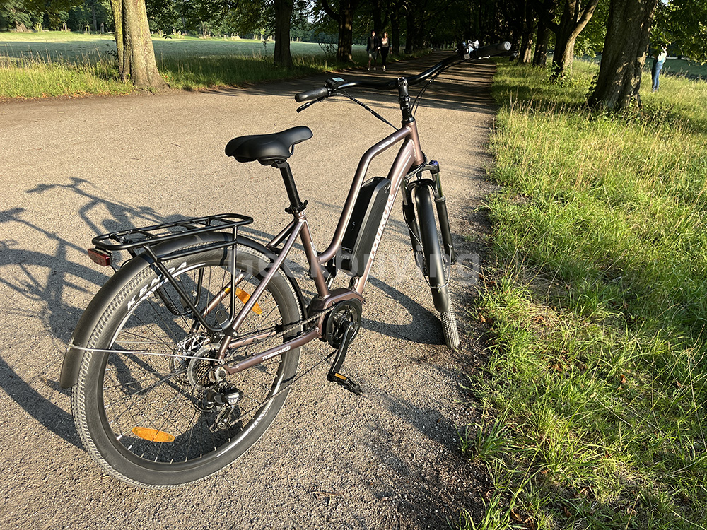 Touroll MA2 Vélo électrique, moteur central 250 W, batterie 36 V 13 Ah, pneus 27,5 pouces, vitesse maximale 25 km/h, autonomie maximale 100 km, frein à disque hydraulique, fourche à suspension avec blocage, transmission Shimano 7 vitesses - Gris