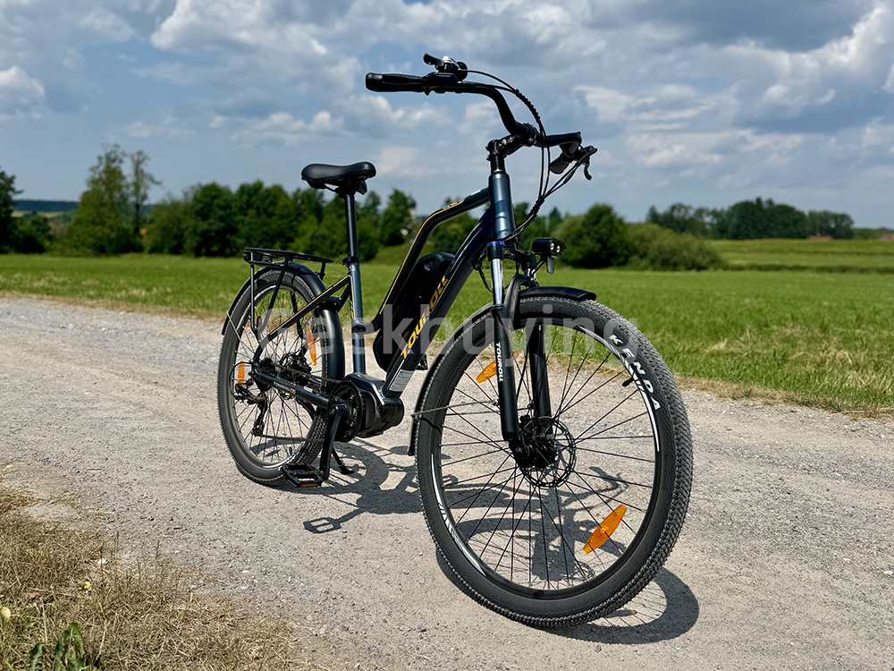 Touroll MA2 elektromos kerékpár, 250 W-os középhajtású motor, 36 V-os 13 Ah-s akkumulátor, 27,5 hüvelykes gumik, 25 km/h maximális sebesség, 100 km-es hatótávolság, hidraulikus tárcsafék, teleszkópos villa zárral, Shimano 7 sebességes - szürke