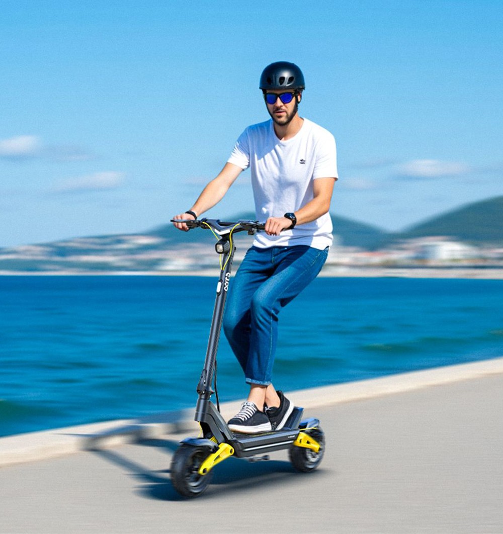 OOTD S10 Folding Electric Scooter 10 Inch Tires 1400W Motor 25km/h Max Speed 48V 20Ah Battery for 60-70km Range 120KG Max Load Disc Brake shock absorption IPX4 APP - Yellow