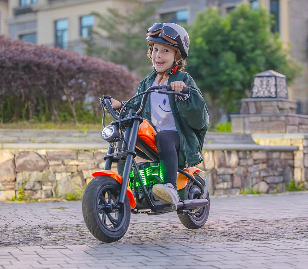 HYPER GOGO Cruiser 12 Plus Electric Motorcycle for Kids 24V 5.2Ah Battery 160W Motor 16km/h Speed 12" x 3" Tires, 12km Max Range  with Odometer, Ambient Lights, Simulated Smoke, Bluetooth Speaker - Orange