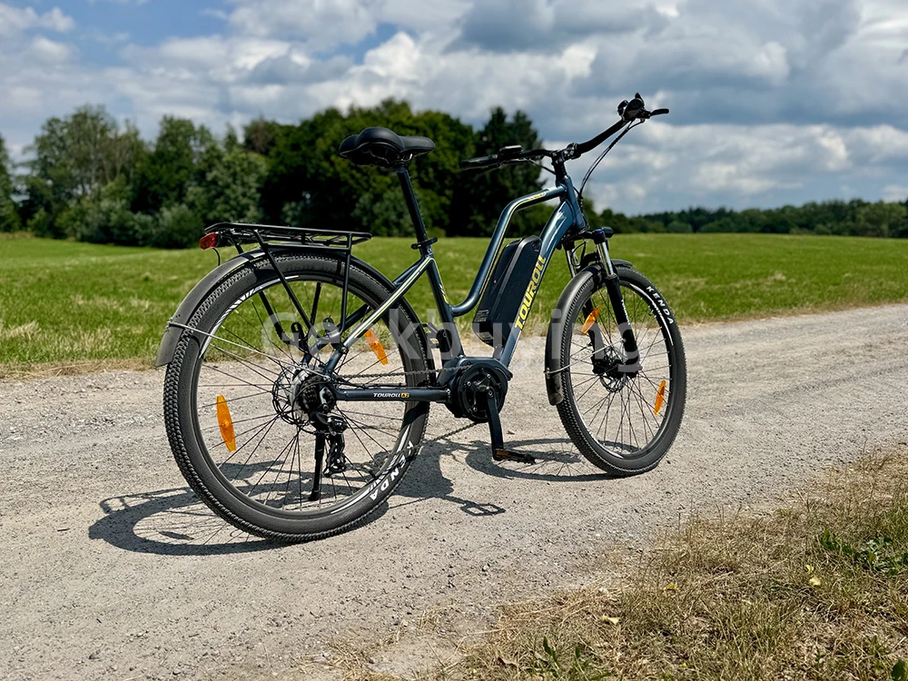 Touroll MA2 Vélo électrique, moteur central 250 W, batterie 36 V 13 Ah, pneus 27,5 pouces, vitesse maximale 25 km/h, autonomie maximale 100 km, frein à disque hydraulique, fourche à suspension avec blocage, transmission Shimano 7 vitesses - Gris