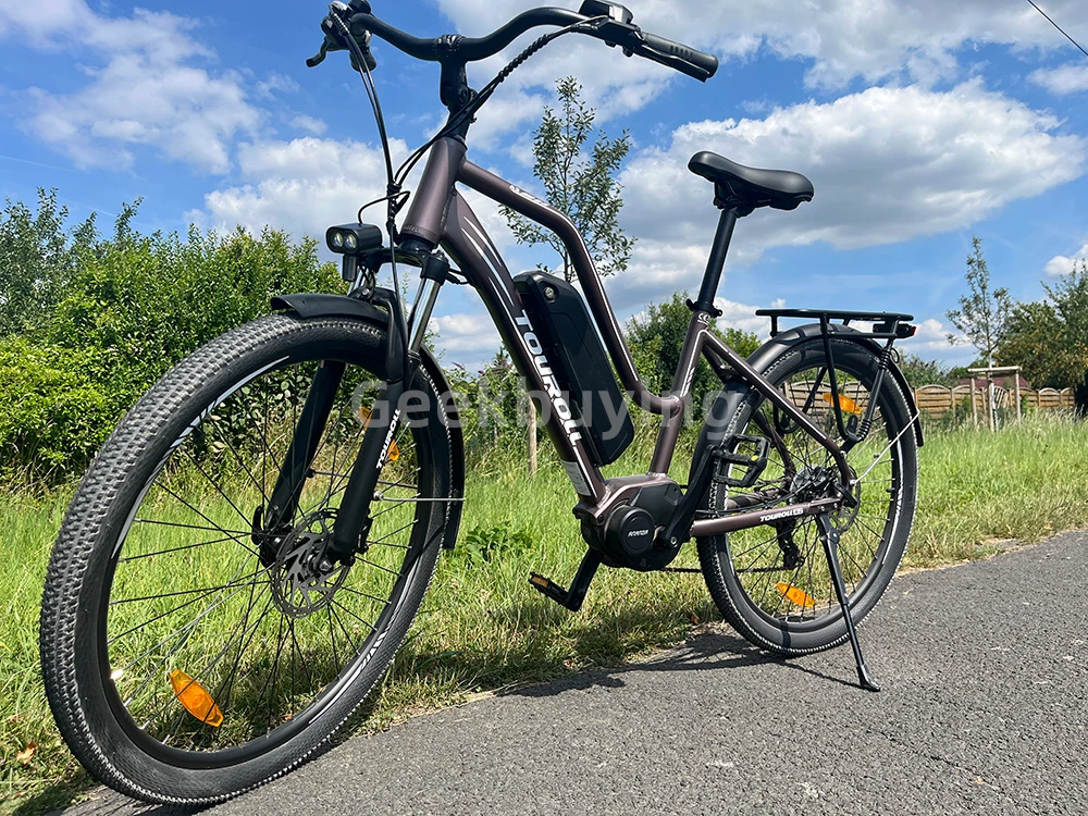 Touroll MA2 Vélo électrique, moteur central 250 W, batterie 36 V 13 Ah, pneus 27,5 pouces, vitesse maximale 25 km/h, autonomie maximale 100 km, frein à disque hydraulique, fourche à suspension avec blocage, transmission Shimano 7 vitesses - Gris