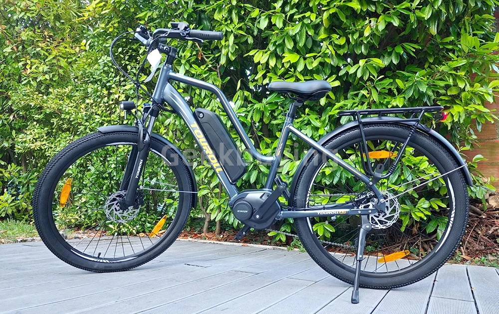 Touroll MA2 Vélo électrique, moteur central 250 W, batterie 36 V 13 Ah, pneus 27,5 pouces, vitesse maximale 25 km/h, autonomie maximale 100 km, frein à disque hydraulique, fourche à suspension avec blocage, transmission Shimano 7 vitesses - Gris