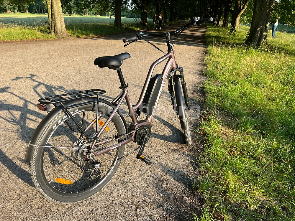 Touroll MA2 Vélo électrique, moteur central 250 W, batterie 36 V 13 Ah, pneus 27,5 pouces, vitesse maximale 25 km/h, autonomie maximale 100 km, frein à disque hydraulique, fourche à suspension avec blocage, transmission Shimano 7 vitesses - Gris