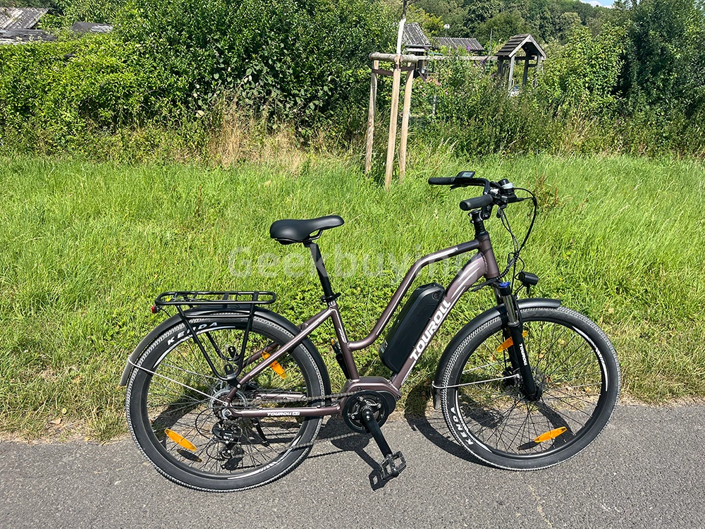 Touroll MA2 Vélo électrique, moteur central 250 W, batterie 36 V 13 Ah, pneus 27,5 pouces, vitesse maximale 25 km/h, autonomie maximale 100 km, frein à disque hydraulique, fourche à suspension avec blocage, transmission Shimano 7 vitesses - Gris