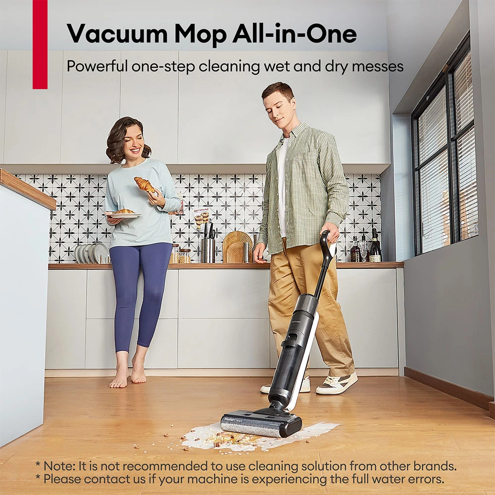 Ultenic AC1 Elite a man and woman cleaning a kitchen