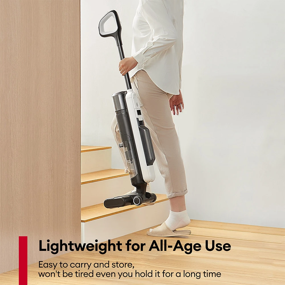 Ultenic AC1 Elite a woman holding a vacuum cleaner