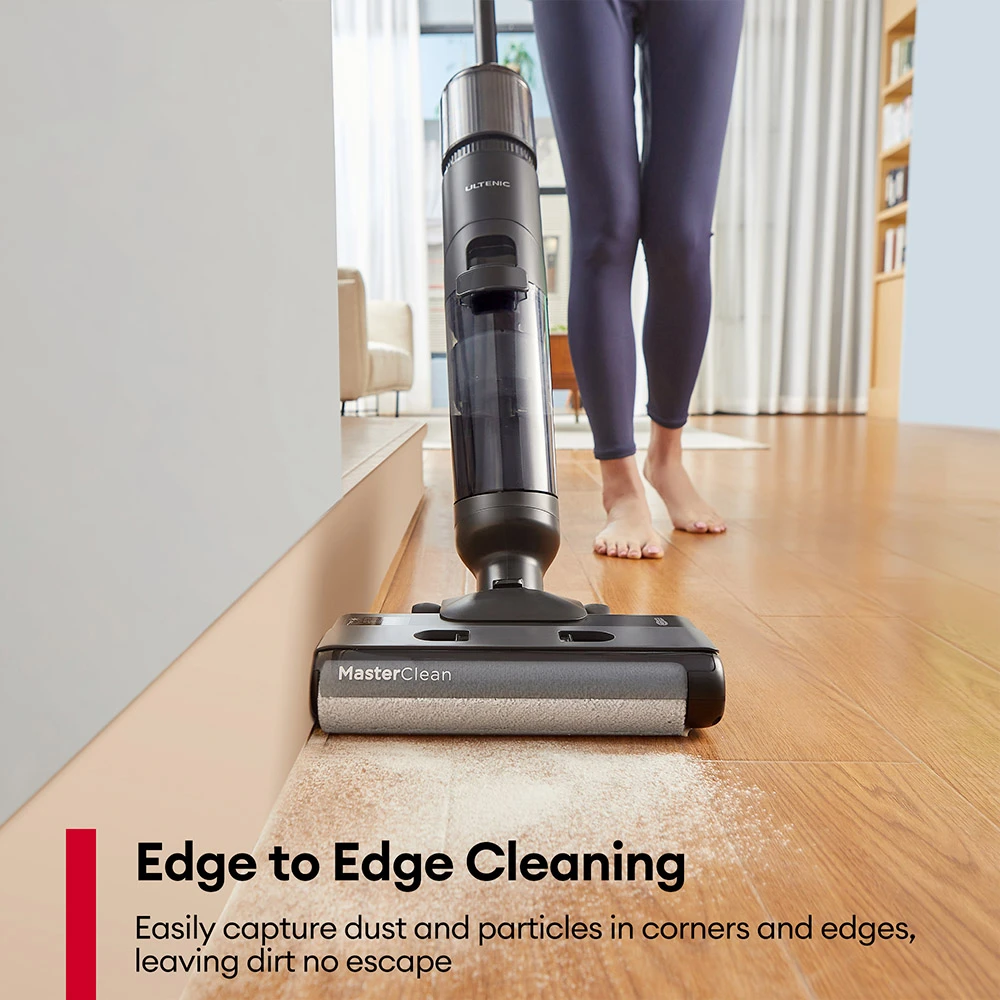 Ultenic AC1 Elite a person vacuuming a wood floor