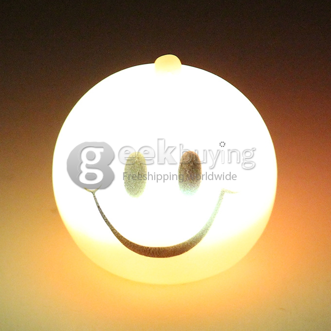Silicon Round Shaped Sense Light Flashlight LED Keychain Light With Smile Face Pattern - Yellow
