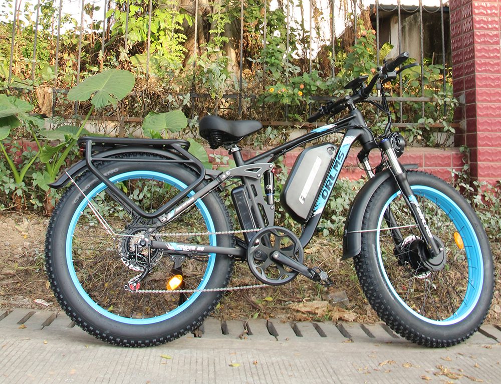 Orlms V3 Elektrofahrrad, 1000 W * 2 Motor, 60 V 25 Ah Akku, 26 * 4,0 Zoll Reifen, 26 * 4,0 Zoll Reifen, 60 km/h Höchstgeschwindigkeit, 120 km maximale Reichweite, hydraulische Bremsen, gefederte Vordergabel, 7-Gang - Blau