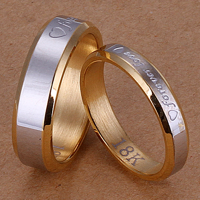 Найти золотое обручальное кольцо. Кольцо Forever Love 18к. Forever Love 18 k кольцо. Кольцо золотое Форевер лав. Очень красивые обручальные кольца парные.