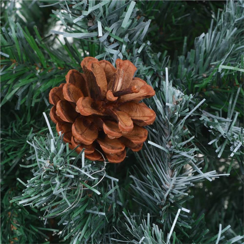 Frosted apsen christmas tree with pinecones