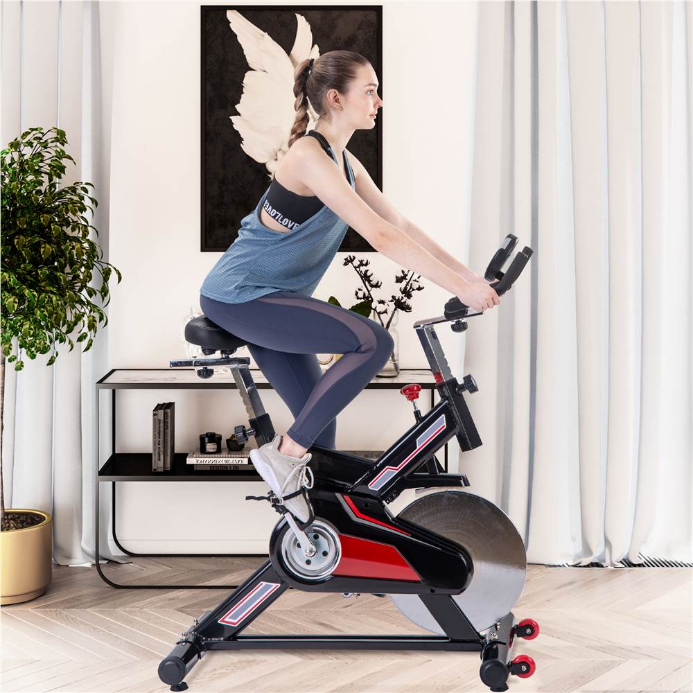 

Merax Indoor Cycling Exercise Bike Belt Drive Stationary Bicycle with LCD Monitor and Comfortable Seat Cushion for Home Cardio Workout - Black and Red